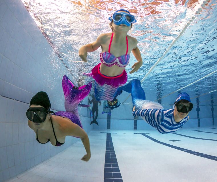 Barcelona: Platja de Llevant PADI Mermaid Experience - Practicing the dolphin kick and duck entry