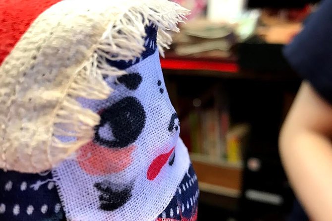 Deep Dive into the World of Daruma Dolls - Writing a wish and painting the Daruma face