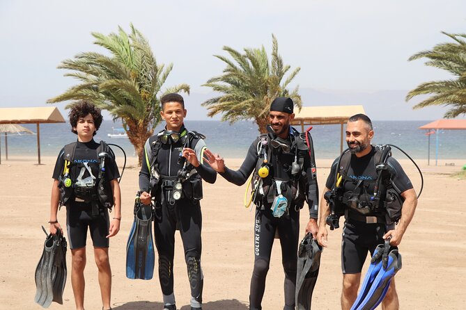 Discover the Depths: Aqaba's Ultimate private Dive Experience - Entering the Red Sea from shore