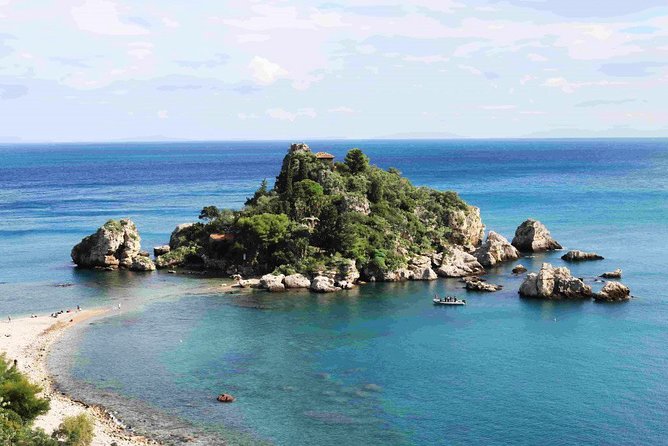 Diving for certified divers with PADI 5<em> Diving Resort – Taormina – Key points to know before booking’ /></p>
<ul>
<li><strong>Two guided underwater sessions at Isola Bella:</strong> The main program visits Taormina’s Marine Reserve by boat and includes two sessions in the water.</li>
<li><strong>A full morning starts at 8:00 a.m.:</strong> You meet at Sea Spirit’s resort at Hotel Naxos Beach, prepare equipment, and return around 2:00 to 2:30 p.m.</li>
<li><strong>Boat transfer is included:</strong> Transport from the resort to the harbor in Giardini Naxos is part of the arrangement, so you do not need to organize your own harbor transfer.</li>
<li><strong>Snacks are part of the experience:</strong> Fresh fruit, iced tea, water, Sicilian wine, and almond biscuits help break up the morning.</li>
<li><strong>The crew puts safety first:</strong> Detailed briefings, maintained rental gear, and clear routines are recurring strengths of the operation.</li>
<li><strong>Non-certified options are available:</strong> Try sessions and snorkeling can be included in the daily program, but this particular booking is aimed at certified divers.</li>
</ul>
<h2>From Hotel Naxos Beach to the Isola Bella reserve</h2>
<p><img width="669" height="446" decoding="async" src=