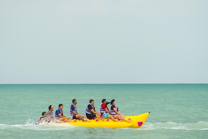 Grand Island Adventure: Diving and Water Sports Thrills - The boat ride and Grand Island setting