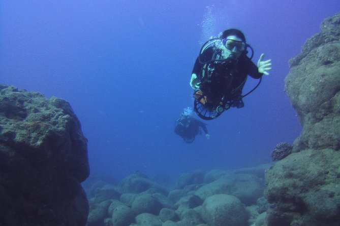 Kauai's Ultimate Scooter Adventure 2 Tank Dive (Advance Certified Divers Only) - Two tanks, reef scenery, and Sheraton Caverns