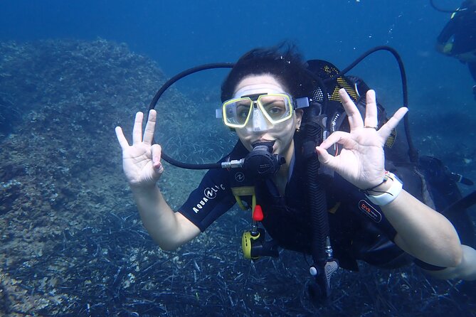 Mallorca: Try Scuba Diving in a Beautiful Nature Reserve - Entering Cala Delta Bay from the shore