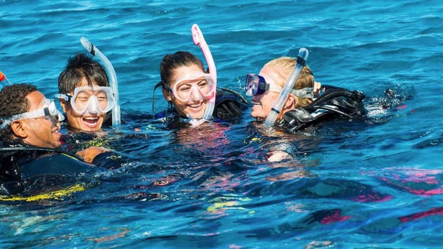 Mauritius: East Belle Mare Scuba Diving Tour - Entering the clear waters of East Coast Mauritius