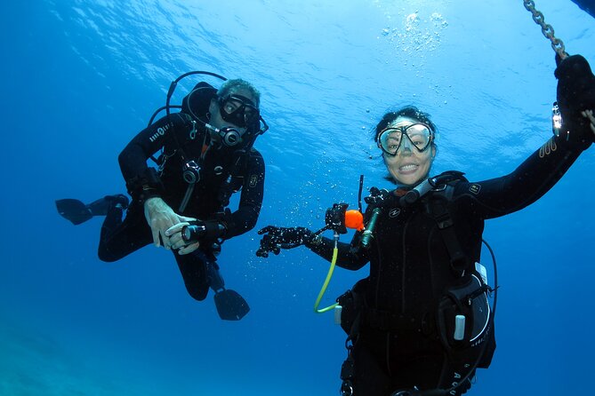 Private Discover Scuba Diving for Beginners in Athens with Pickup - Entering the water near Vouliagmeni Lake