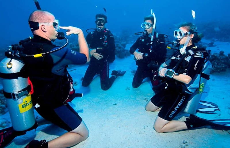 Salou: Fun Scuba Dive with Instructor (No License Needed) - Entering the water for a shallow underwater outing