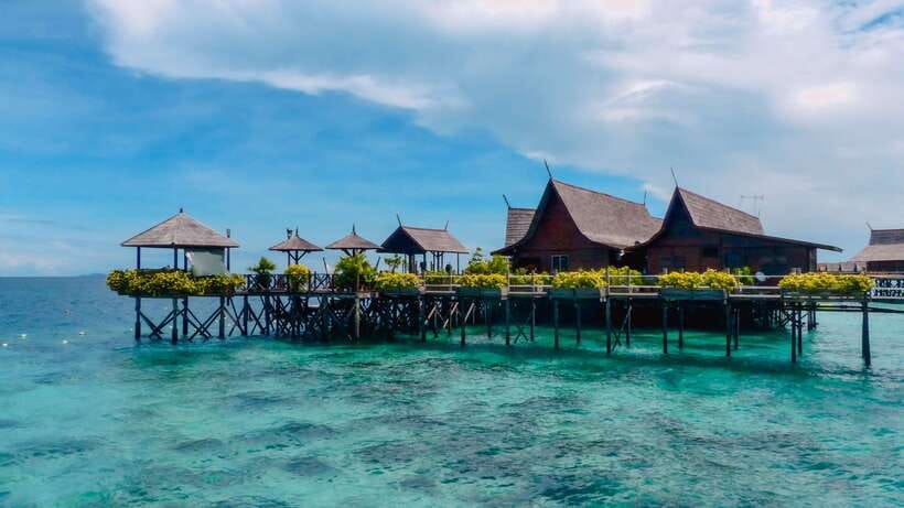 Semporna: Mabul and Kapalai Trip in Snorkel or Dive & Lunch - Mabul Water Bungalows and the water village