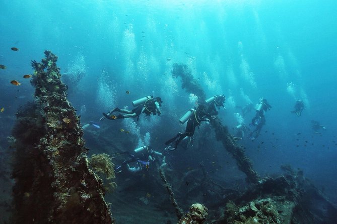 Tulamben Diving Tour Shipwreck USS Bali - Getting fitted with equipment in Tulamben